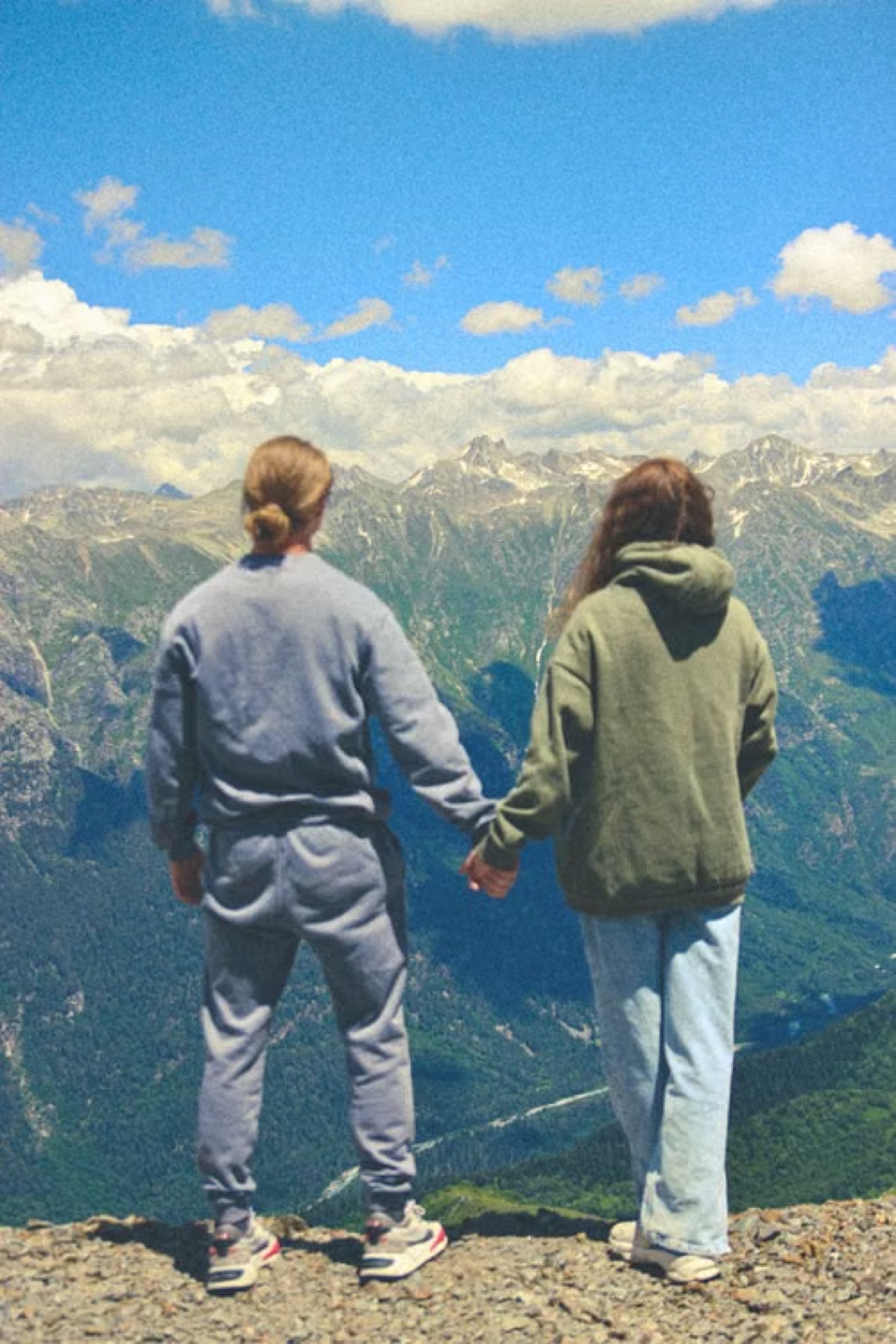 A couple holding hands outdoors, suggesting emotional balance and mutual support.