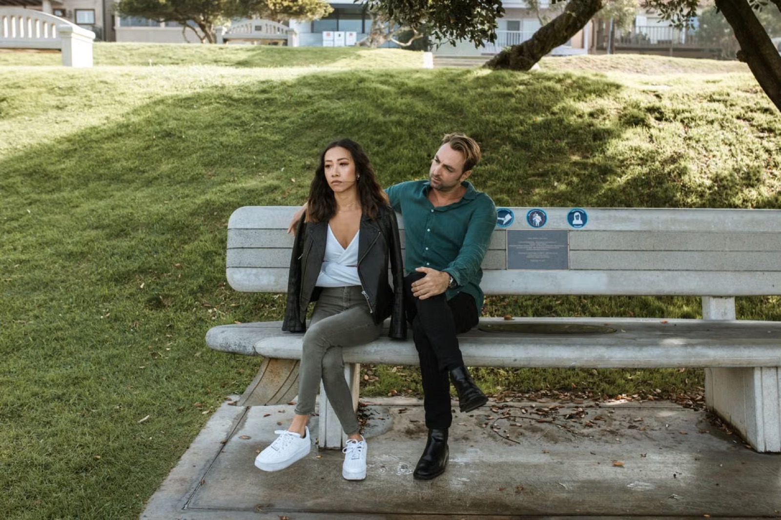 A couple having a careful conversation after emotional strain, showing boundaries and effort to reconnect.