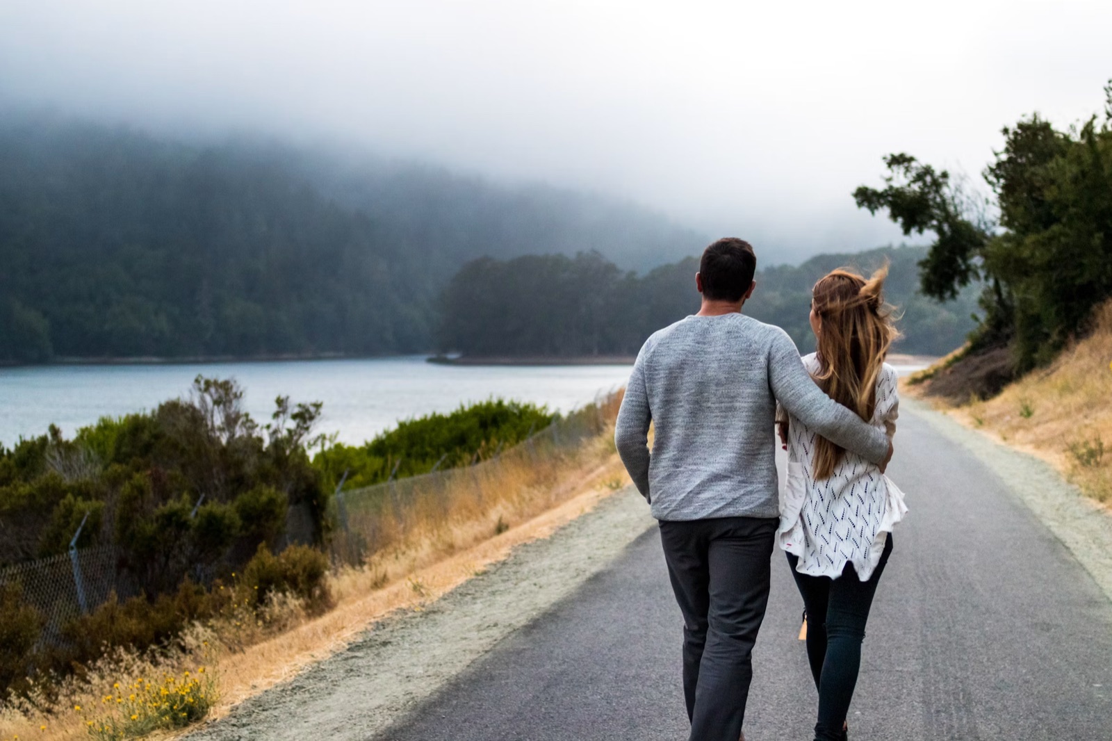 A couple moving forward together in a real outdoor setting, reflecting alignment, shared direction, and the need for honest planning in love.
