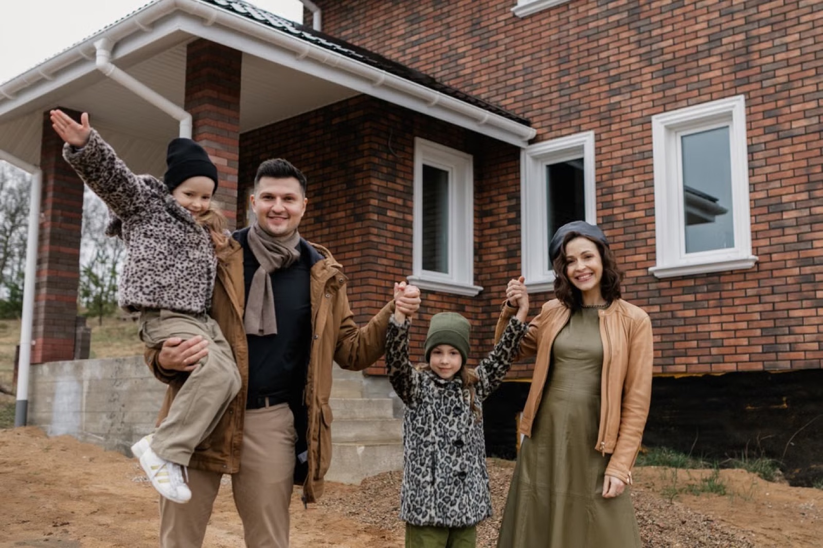 A warm family-focused scene that suggests building a future together, stability, and shared home life