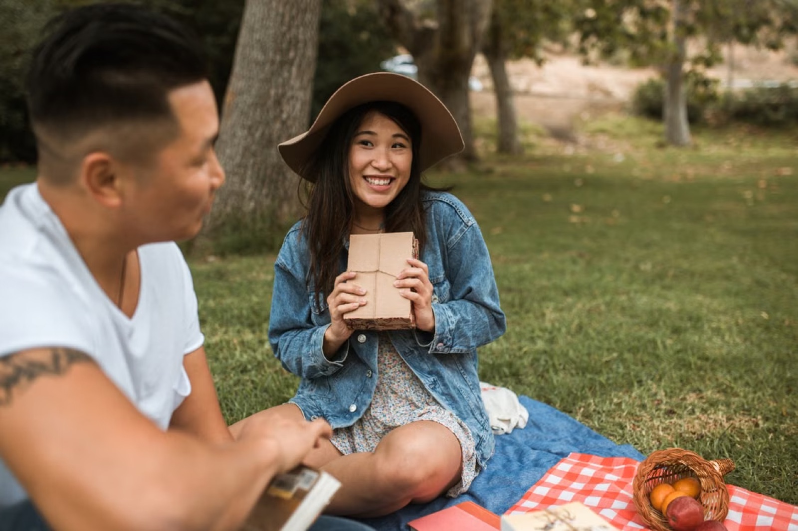 A relaxed outdoor couple scene that suggests reciprocity, balance, and mutual support
