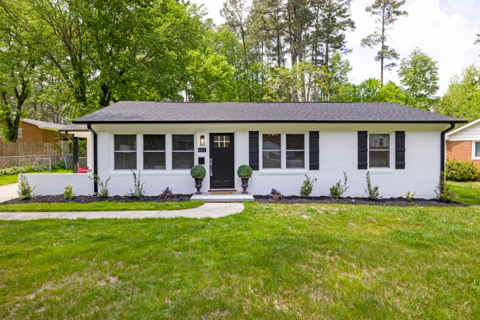 A calm residential exterior that suggests stability, strong foundations, and long-term security
