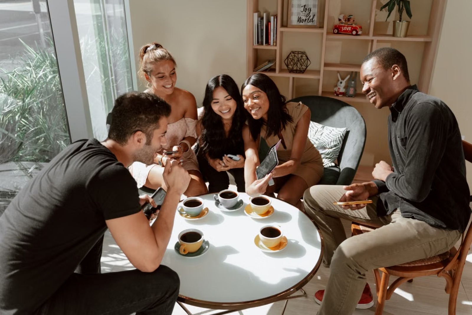 A lively social scene that represents positive collaboration, ease, and friendly appreciation outside romantic contexts.