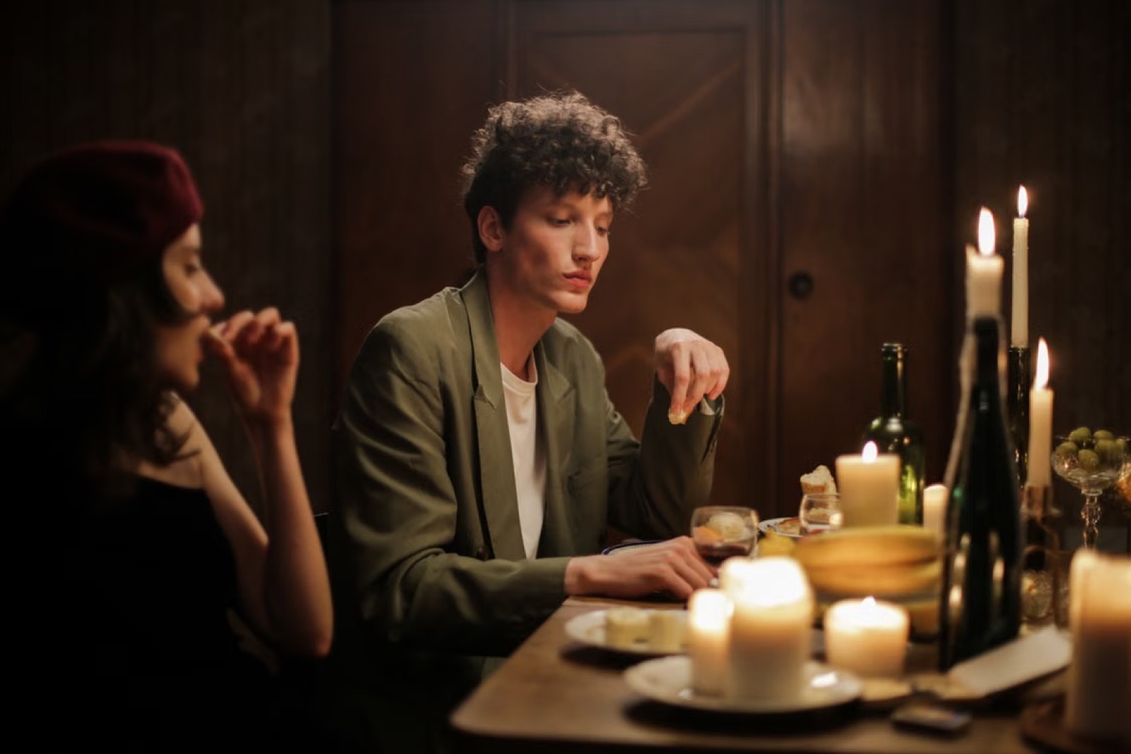 Two people in a quiet real-life conversation, showing caution, patience, and feelings that move slowly.