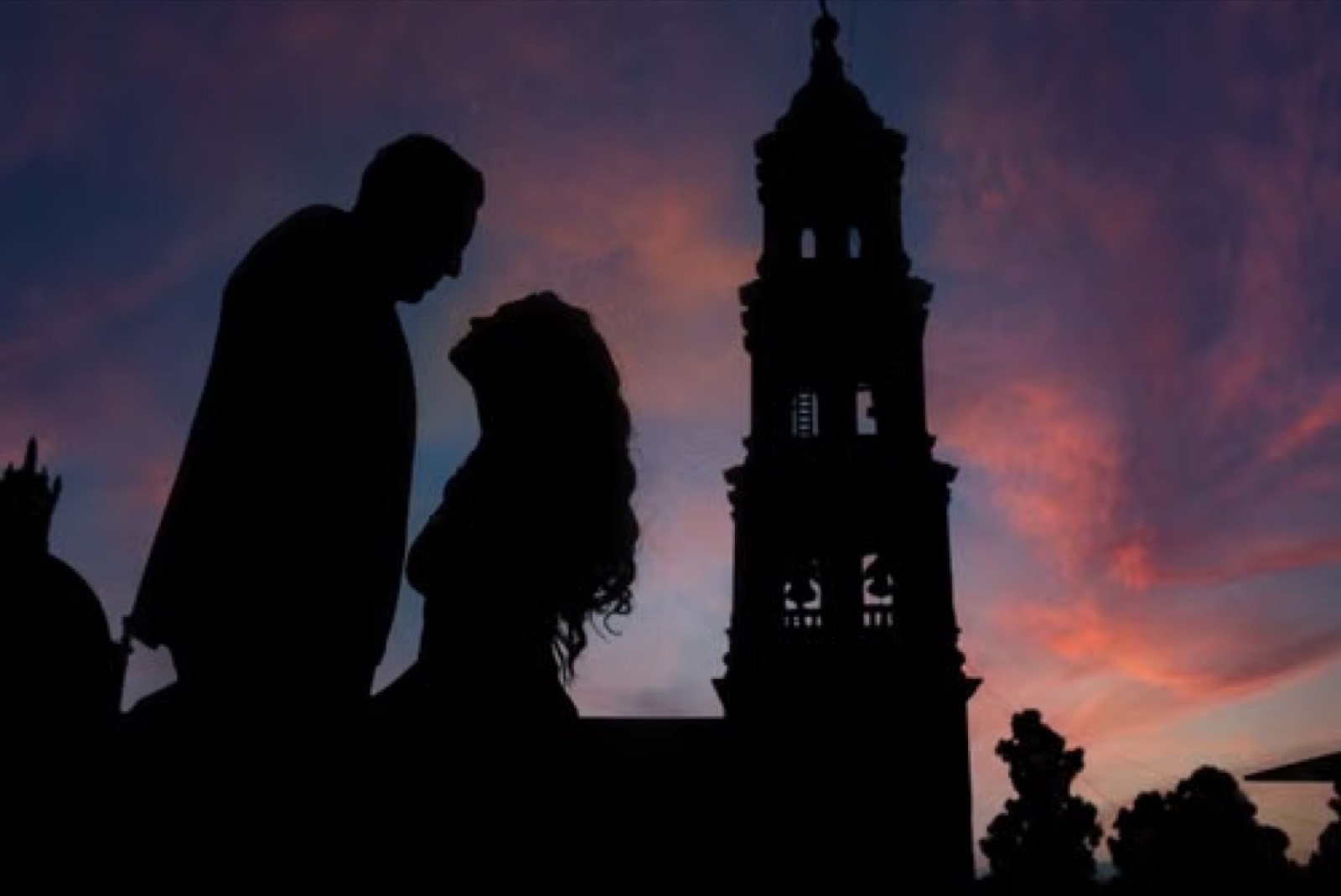 A real-life couple scene with emotional tension, expressing attraction mixed with imbalance rather than simple romance.