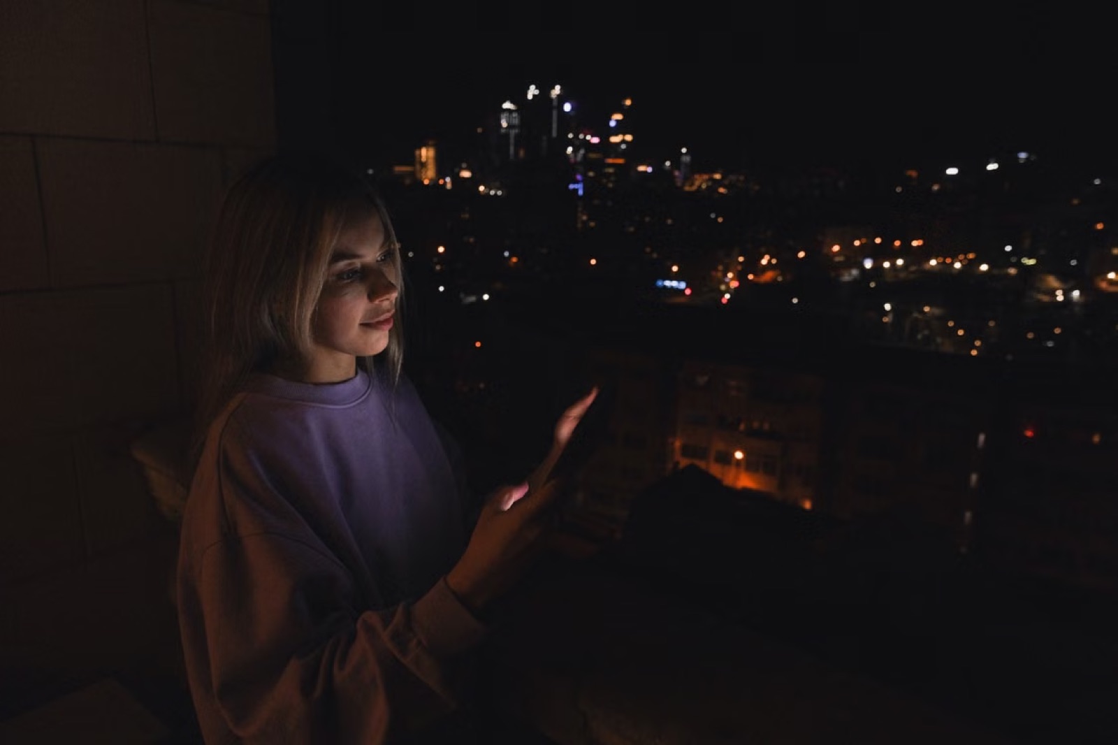 A person pausing among city lights and multiple visual options, reflecting uncertainty, attraction, and the pressure of choice.